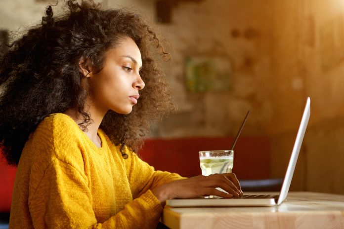 woman-working-on-laptop-guesthouse