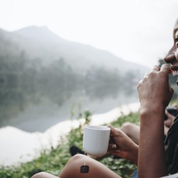 woman-drinking-coffee-while-camping