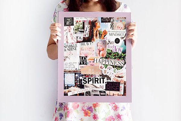 woman-holding-Vision-Board