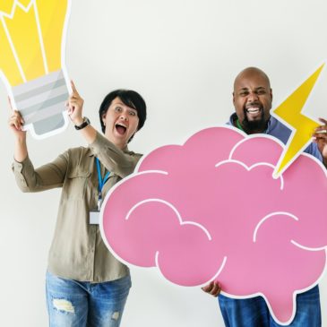 man-woman-holding-sign-idea-brain-activity