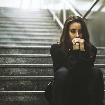 woman-sitting-on-steps-guesthouse