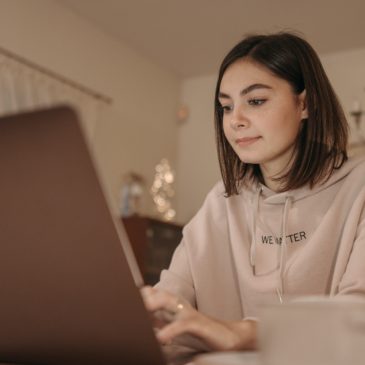 young woman working with her laptop