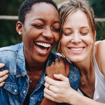 Two women smiling