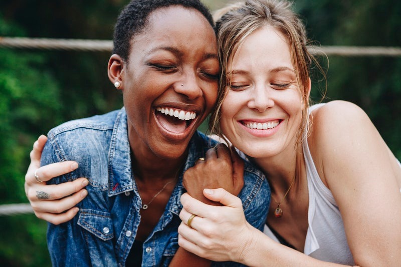 Two women smiling