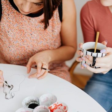 Two people painting