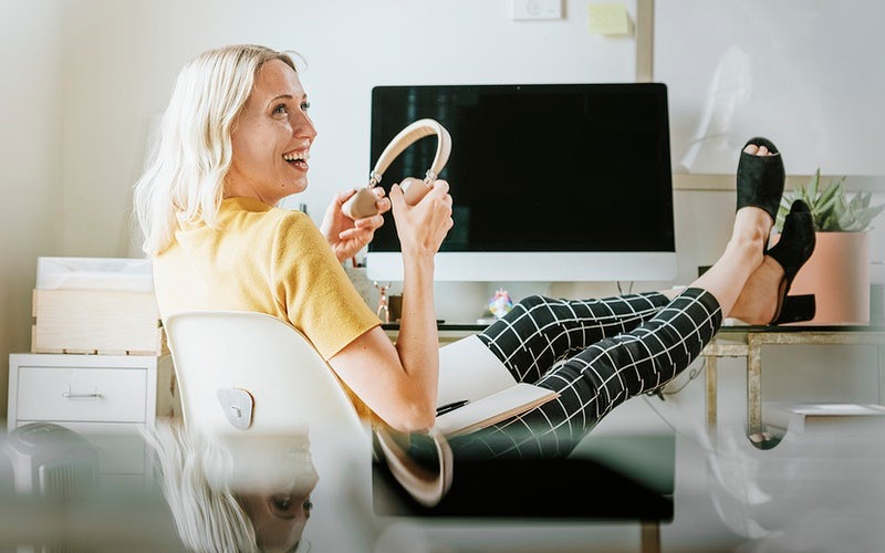 Woman sitting and smiling